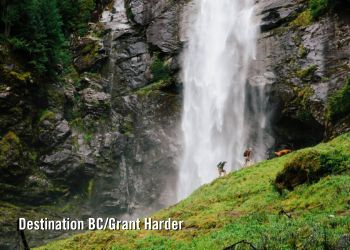 Exstew Falls with hikers and dog in Terrace, BC